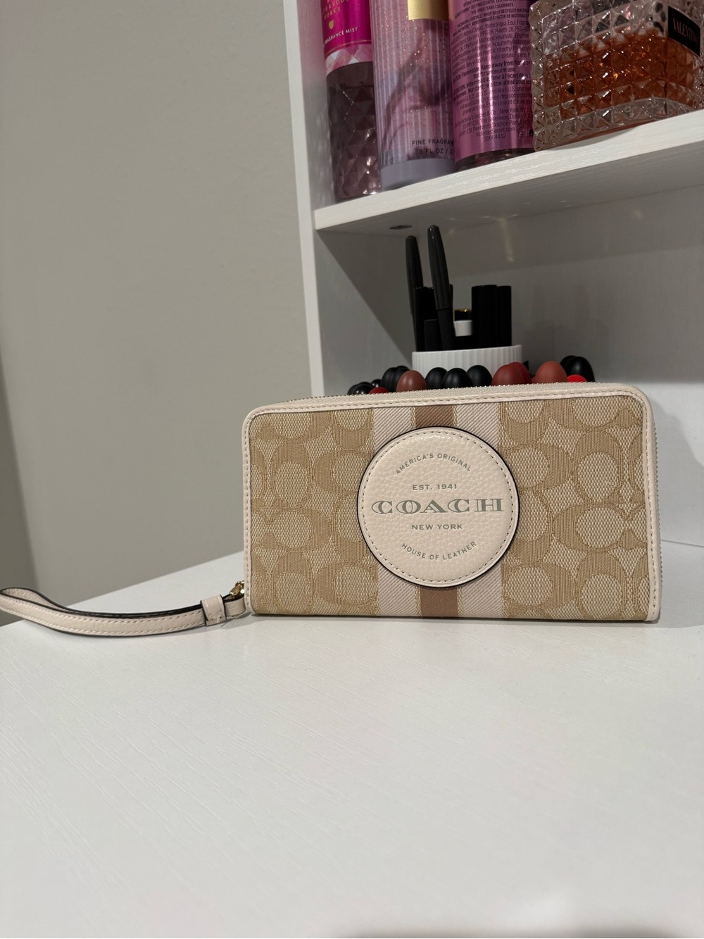 COACH Beige Signature Stripe Zip Wristlet